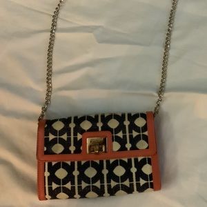 Spartina clutch with gold strap.